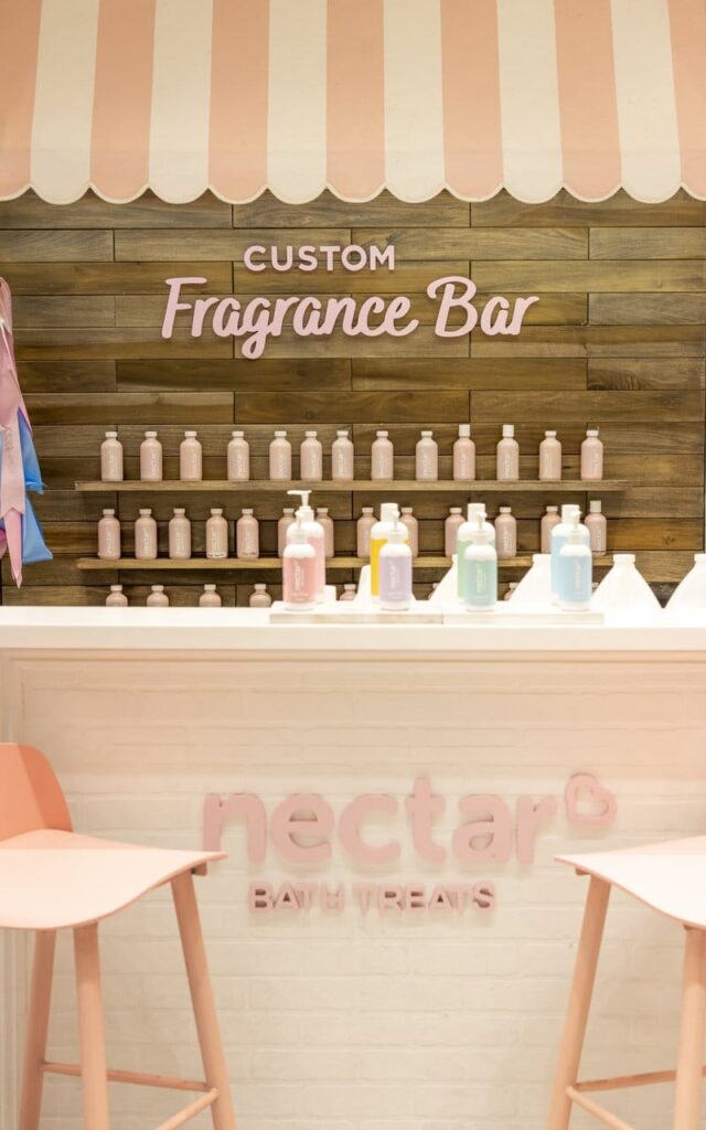 Custom Fragrance Bar with bottles on shelves.