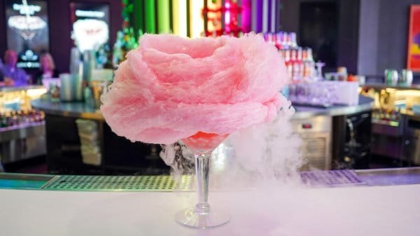 Cotton candy cocktail with dry ice smoke.