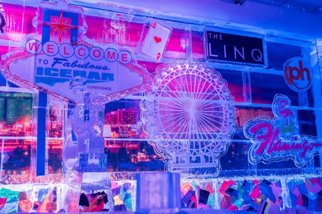 Neon signs and decorations, including a Ferris wheel and playing card.